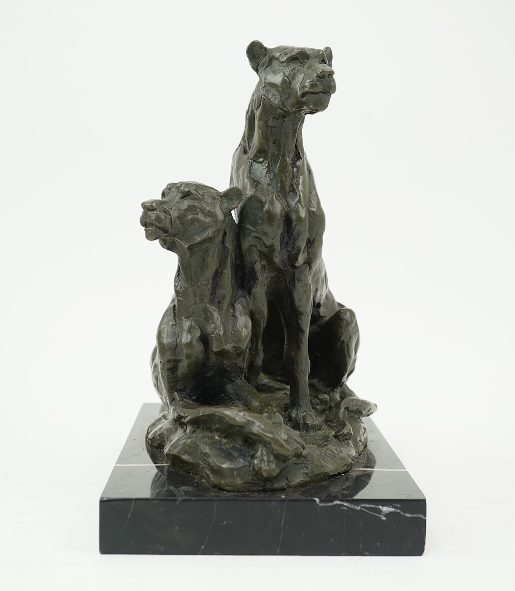 Miguel Fernando Lopez (Portuguese, contemporary): A painted bronze group of two lionesses